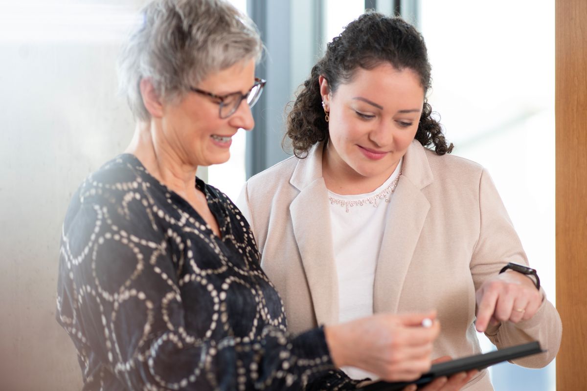 AMW employees in conversation